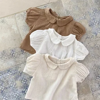 2023 Летние Новые однотонные рубашки с пышными рукавами для маленьких девочек, хлопковые футболки с короткими рукавами для младенцев, повседневные рубашки с отворотами для малышей, Детская одежда